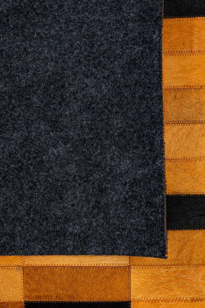 4' 11 x 8' Cowhide - Patchwork Rug