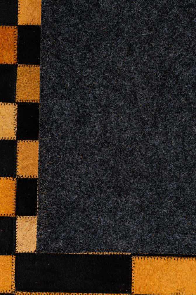 4' 11 x 8' Cowhide - Patchwork Rug