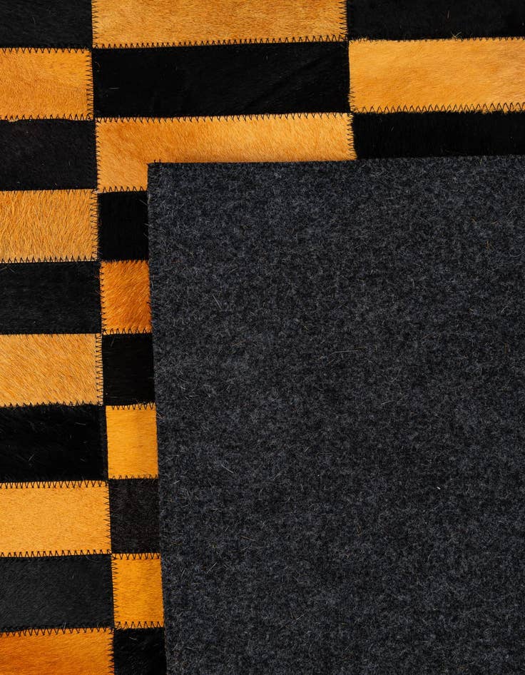 Detail image of 5' 2 x 8' 1 Cowhide - Patchwork Rug