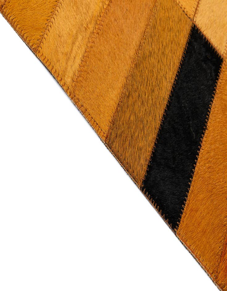 Detail image of 4' 11 x 8' 1 Cowhide - Patchwork Rug