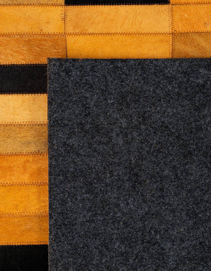 Detail image of 4' 11 x 8' 1 Cowhide - Patchwork Rug