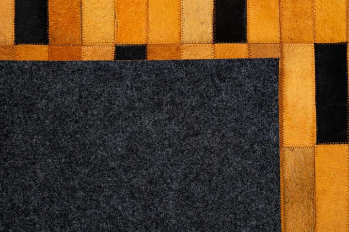 4' 11 x 8' Cowhide - Patchwork Rug