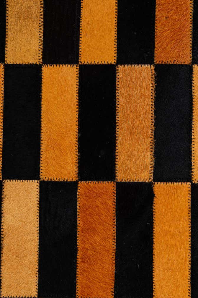 4' 11 x 8' Cowhide - Patchwork Rug
