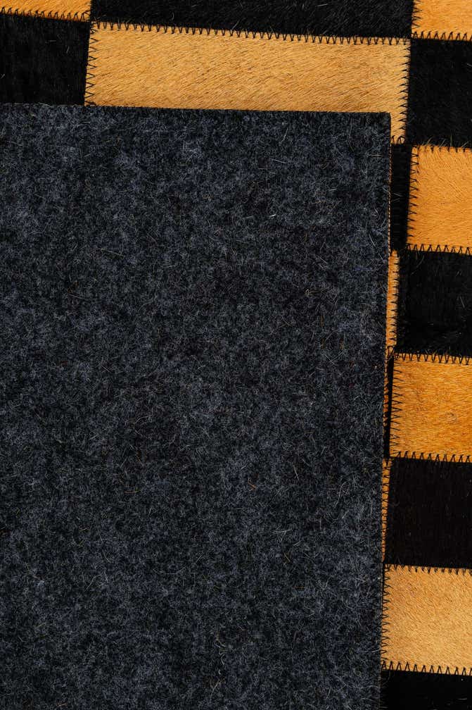 4' 11 x 8' Cowhide - Patchwork Rug