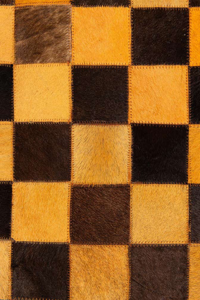 5' 2 x 8' 1 Cowhide Stocks Rug