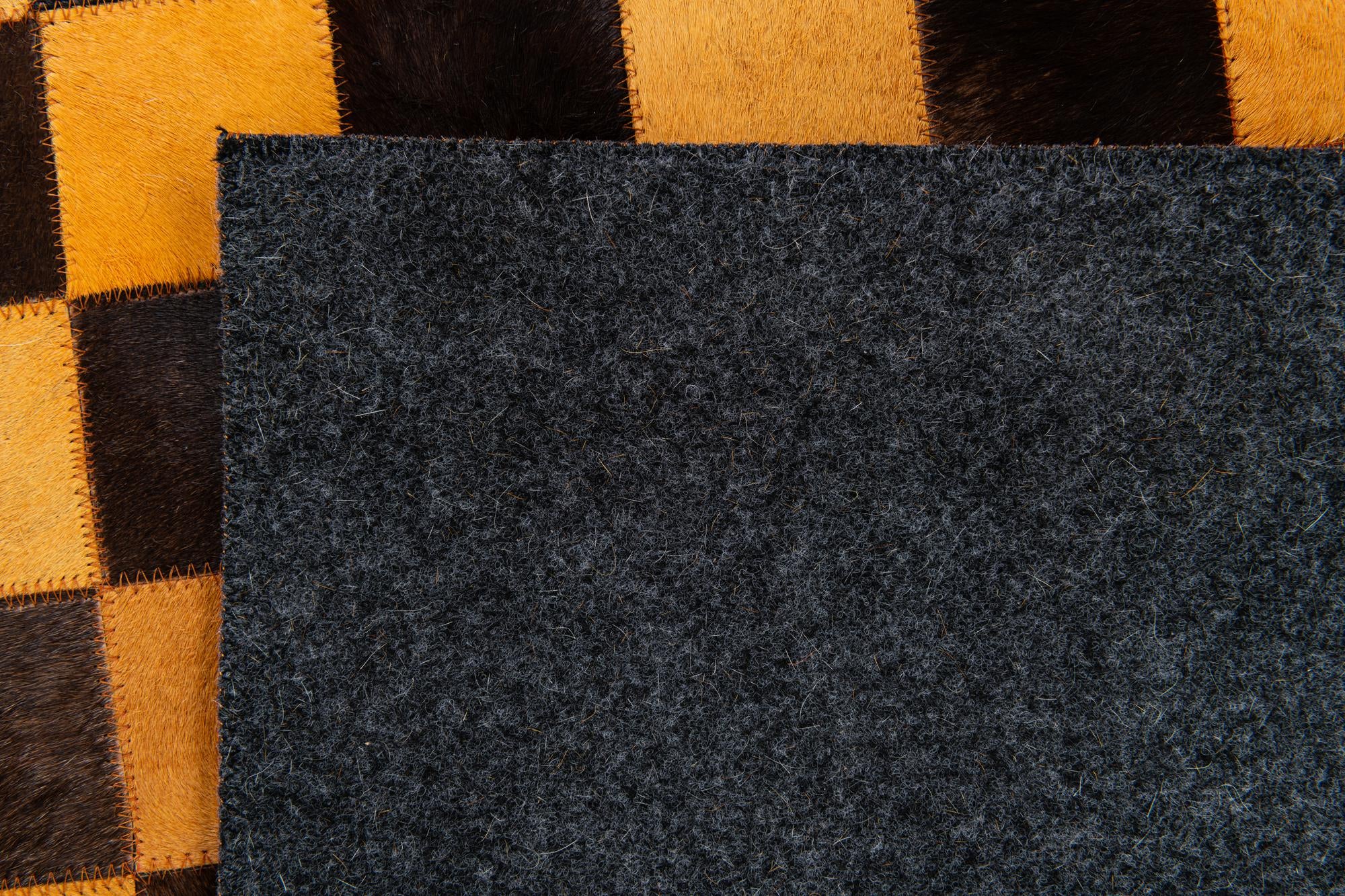 5' 2 x 8' 1 Cowhide Stocks Rug