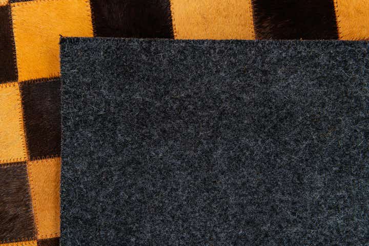 5' 2 x 8' 1 Cowhide Stocks Rug