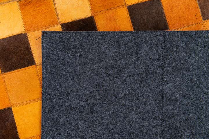 5' 2 x 8' 1 Cowhide Stocks Rug