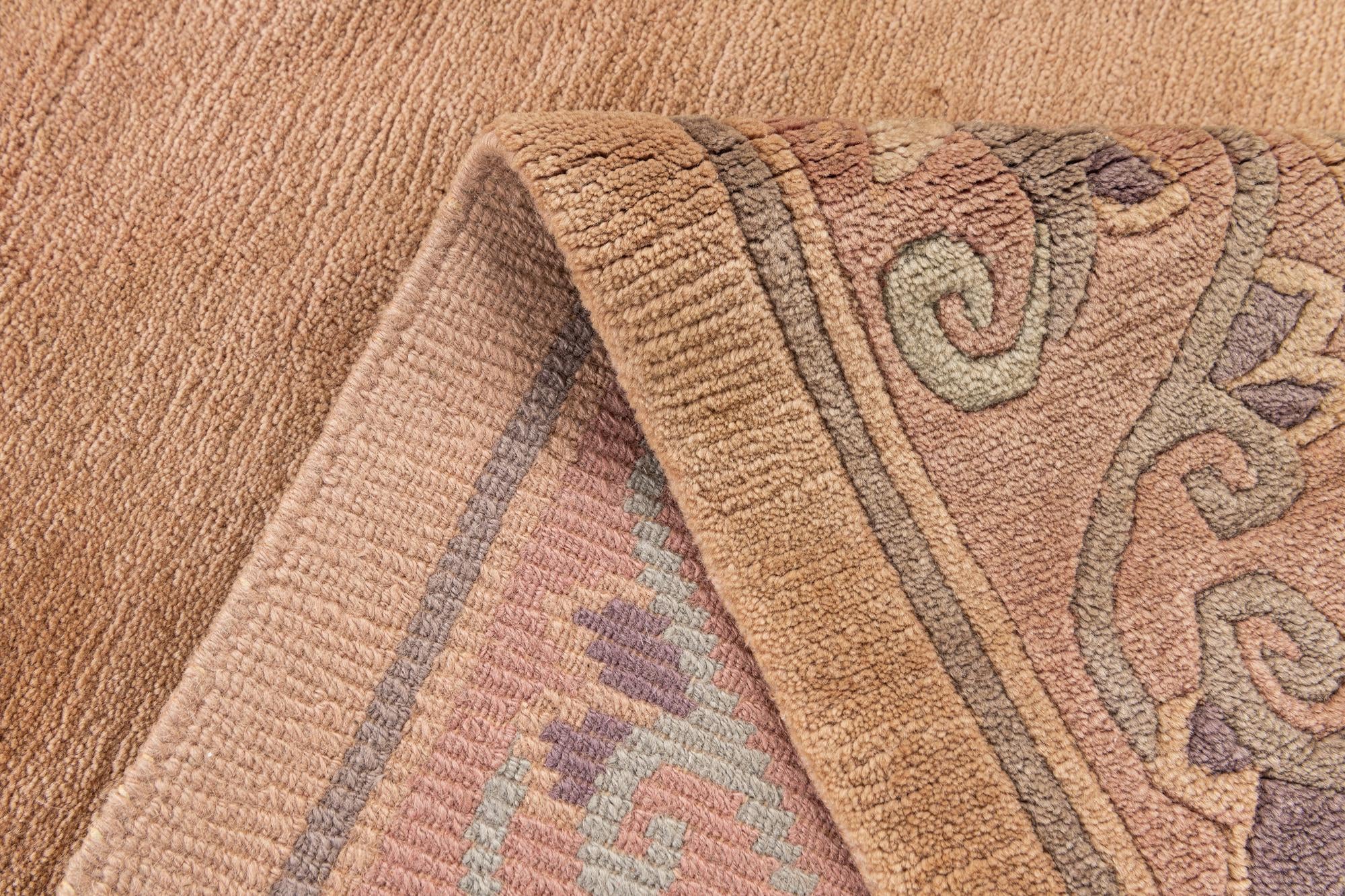 6' 7 x 10' Hand Knotted Tibet Wool Rug