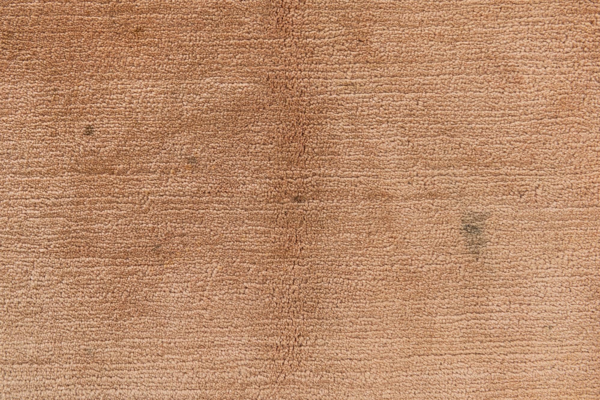 6' 7 x 10' Hand Knotted Tibet Wool Rug