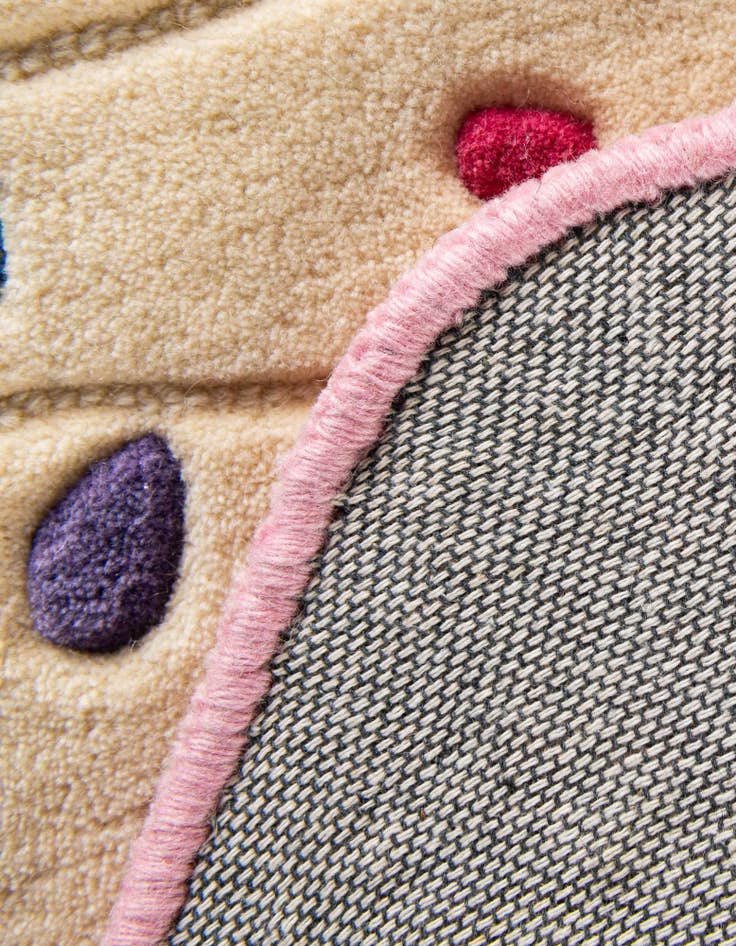 Detail image of 4' 8 x 5' 3 Happy Rugs Cupcake Wool