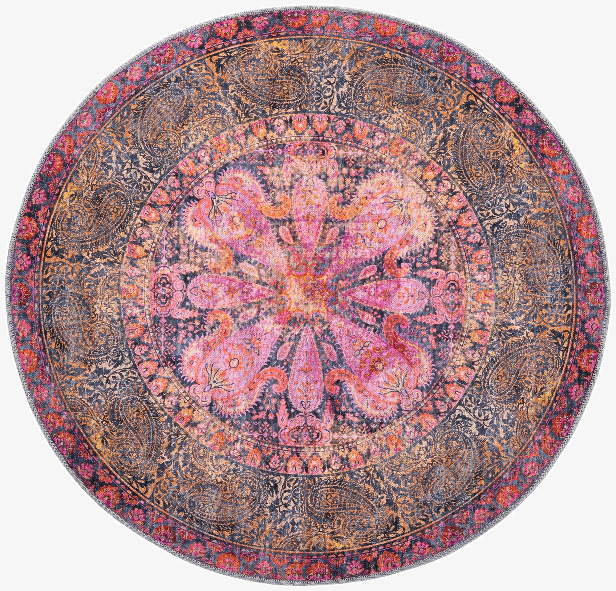 A vibrant 5' 3" round pink, orange, and blue traditional medallion rug with a vintage distressed look.