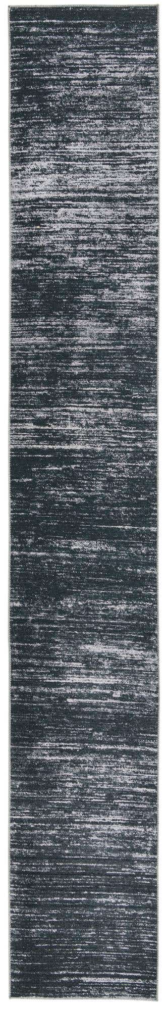 2' 6 x 16' Prewitt · Linear abstract rug, black and ivory