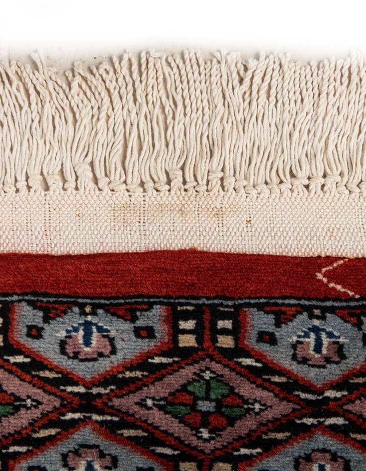 Detail image of 4' 3 x 5' 10  Hand Knotted Bokhara Oriental Wool Rug