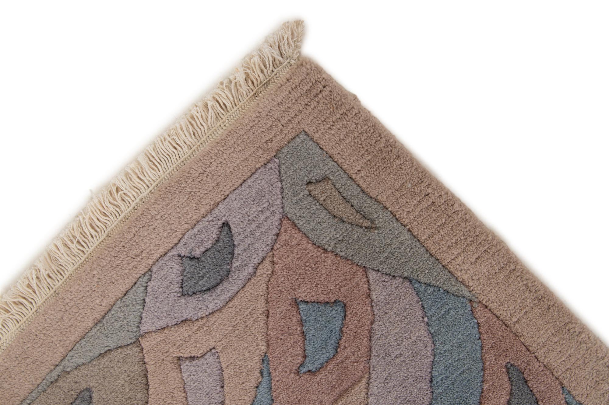 5' 9 x 7' 11 Hand Knotted Tibet Wool Rug