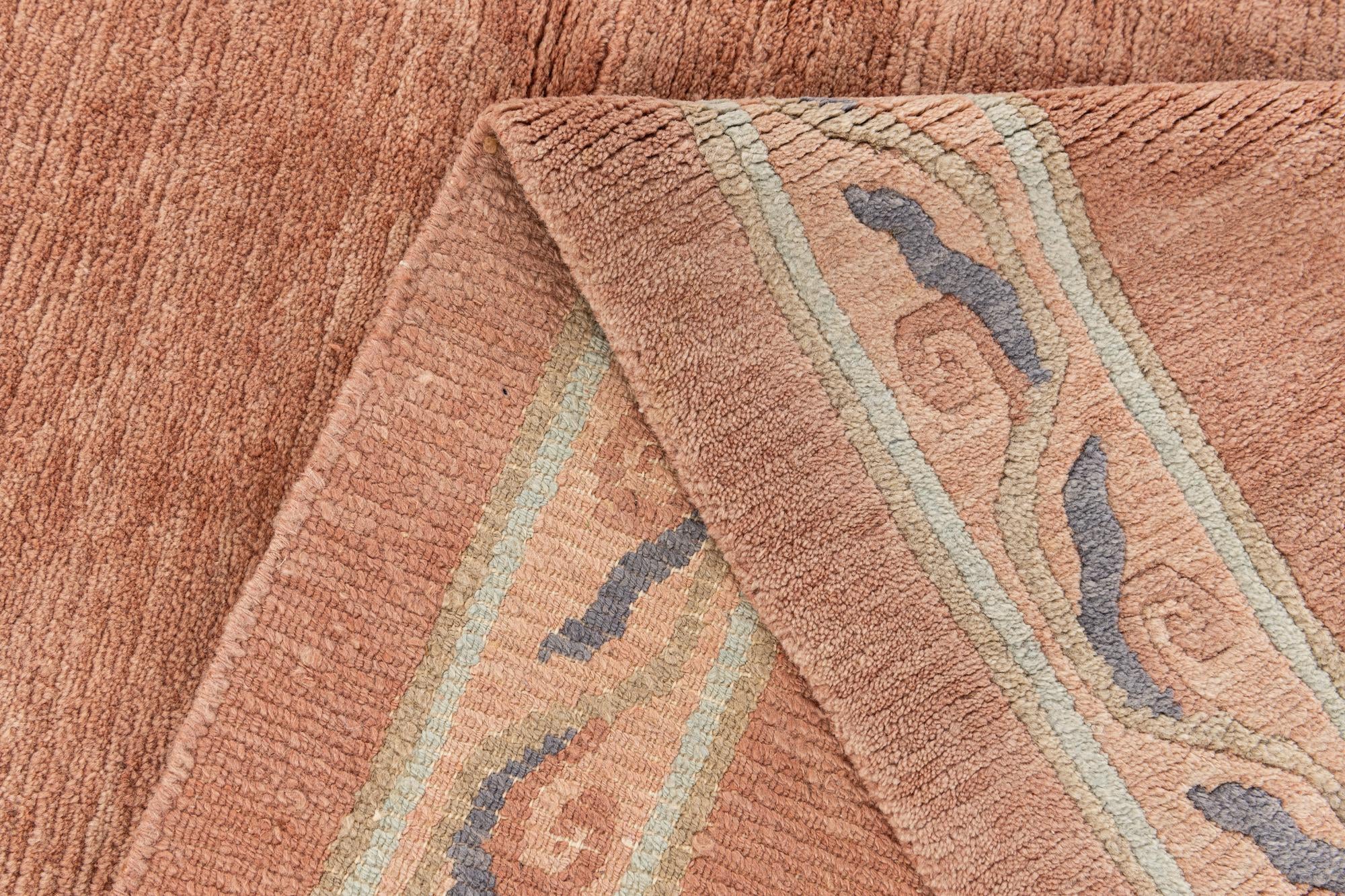 6' 11 x 9' 6 Hand Knotted Tibet Wool Rug
