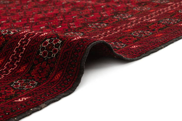 Detail image of 4' 3 x 6' 9 Hand Knotted Afghan Akhche Wool Rug