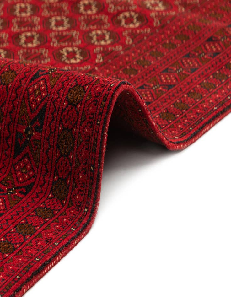 Detail image of 4' 2 x 6' 7  Hand Knotted Afghan Akhche Wool Rug