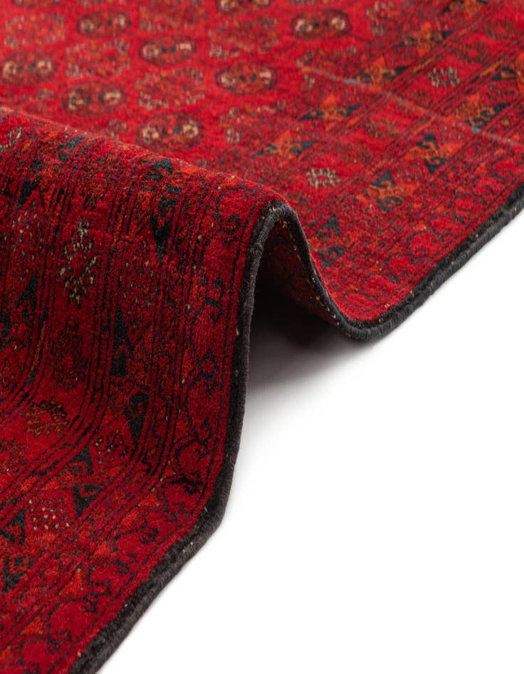 Detail image of 4' 1 x 5' 10  Hand Knotted Afghan Akhche Wool Rug