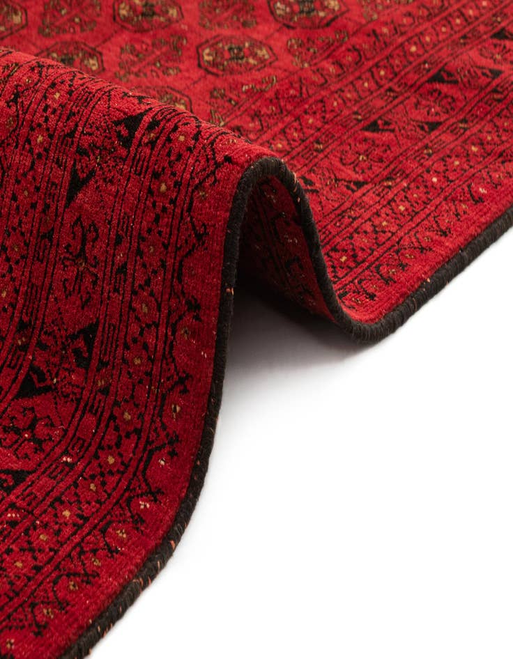 Detail image of 4' 1 x 6' 6  Hand Knotted Afghan Akhche Wool Rug