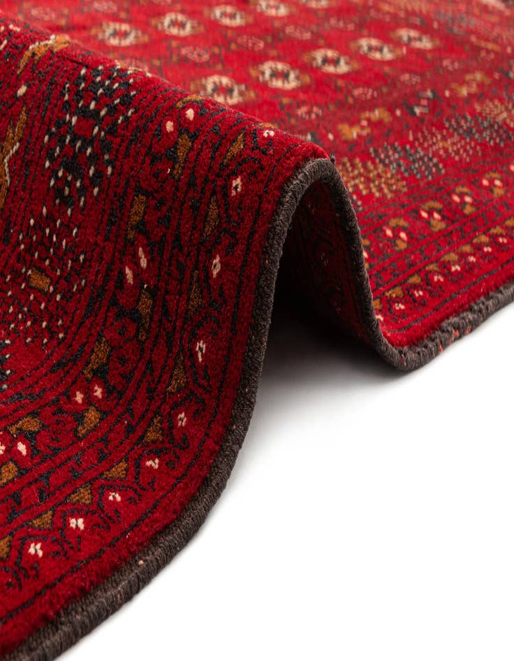 Detail image of 4' 1 x 6' 4 Hand Knotted Afghan Akhche Wool Rug