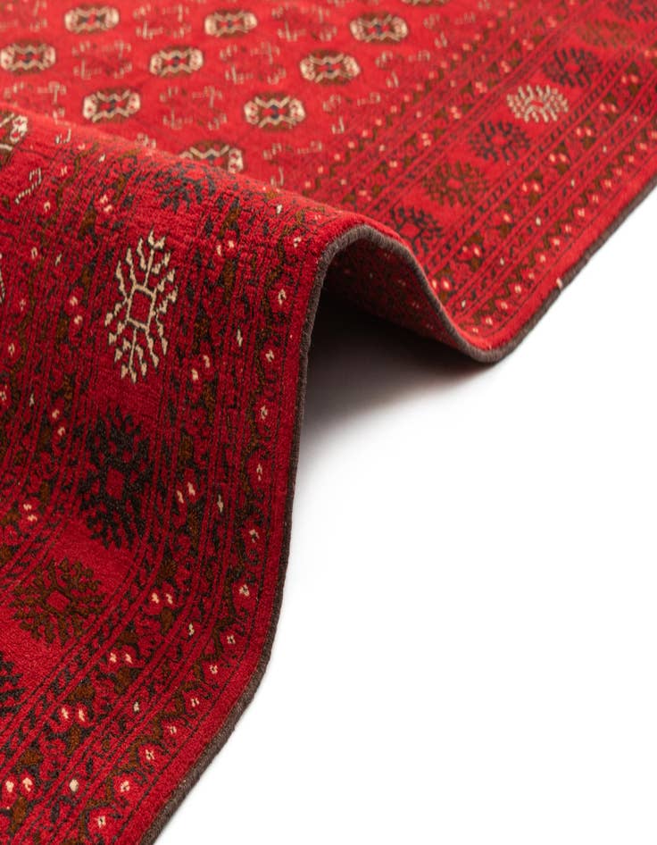 Detail image of 4' x 6' 2 Hand Knotted Afghan Akhche Wool Rug