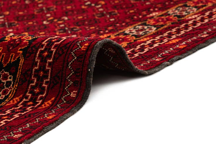 Detail image of 4' 1 x 6' 9 Hand Knotted Afghan Akhche Wool Rug