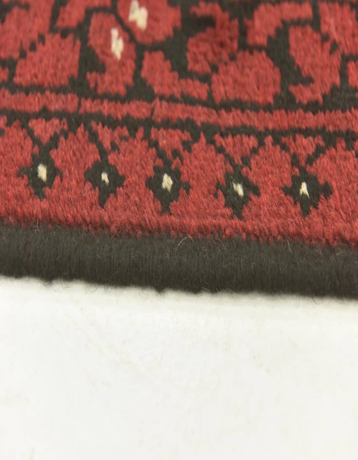 Detail image of 4' 10 x 6' 5  Hand Knotted Afghan Akhche Wool Rug