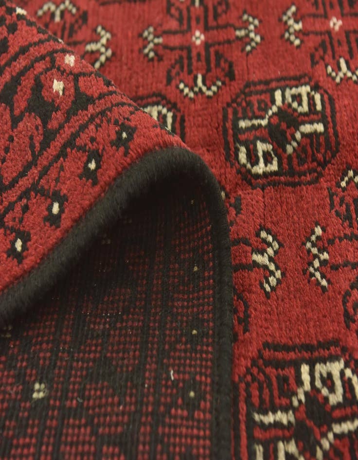 Detail image of 4' 10 x 6' 5  Hand Knotted Afghan Akhche Wool Rug