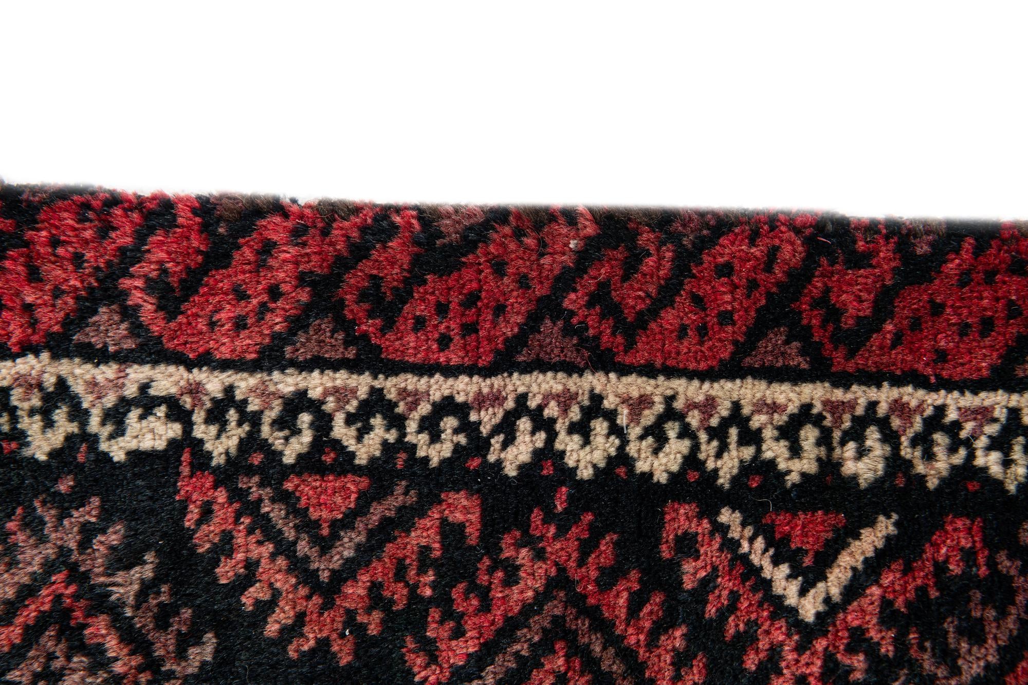 3' 9 x 5' 7 Hand Knotted Balouch Wool Rug