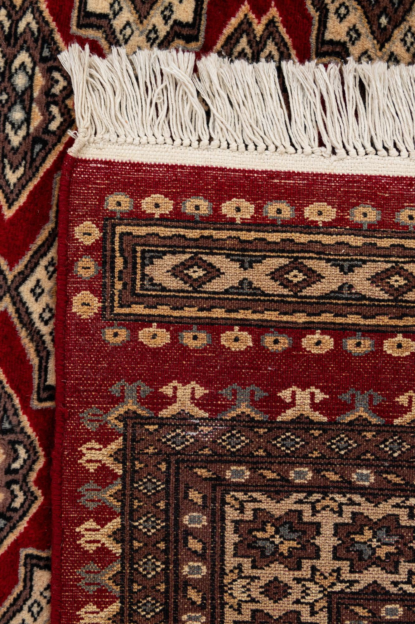 4' 1 x 6' 6 Hand Knotted Bokhara Wool Rug