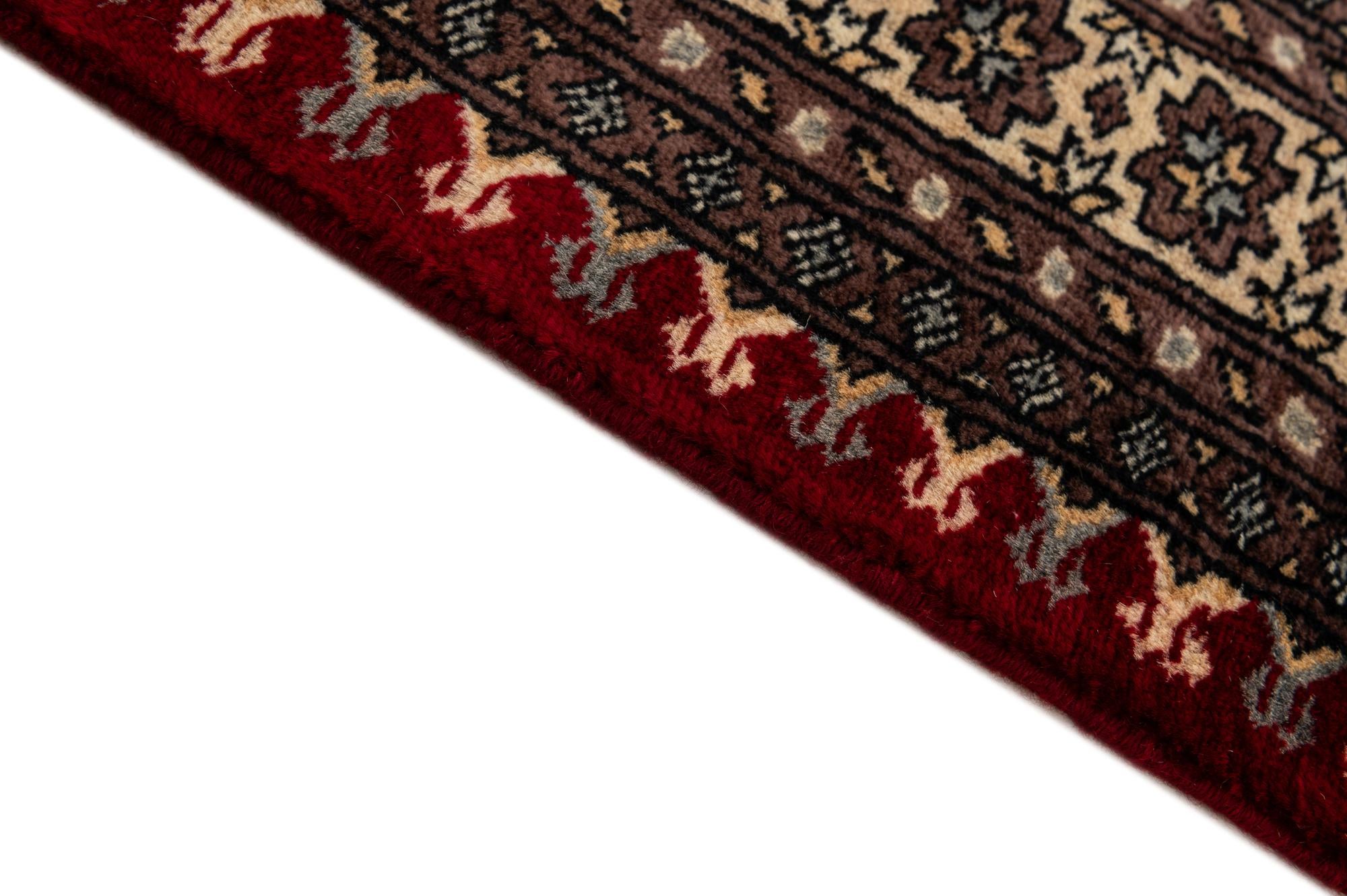 4' 1 x 6' 6 Hand Knotted Bokhara Wool Rug
