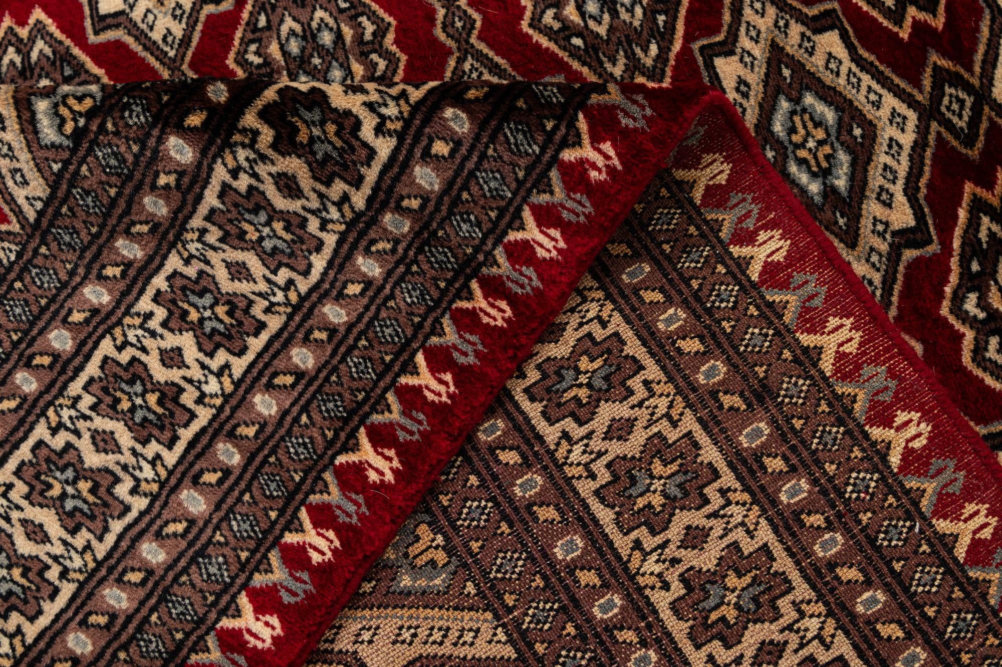 4' 1 x 6' 6 Hand Knotted Bokhara Wool Rug