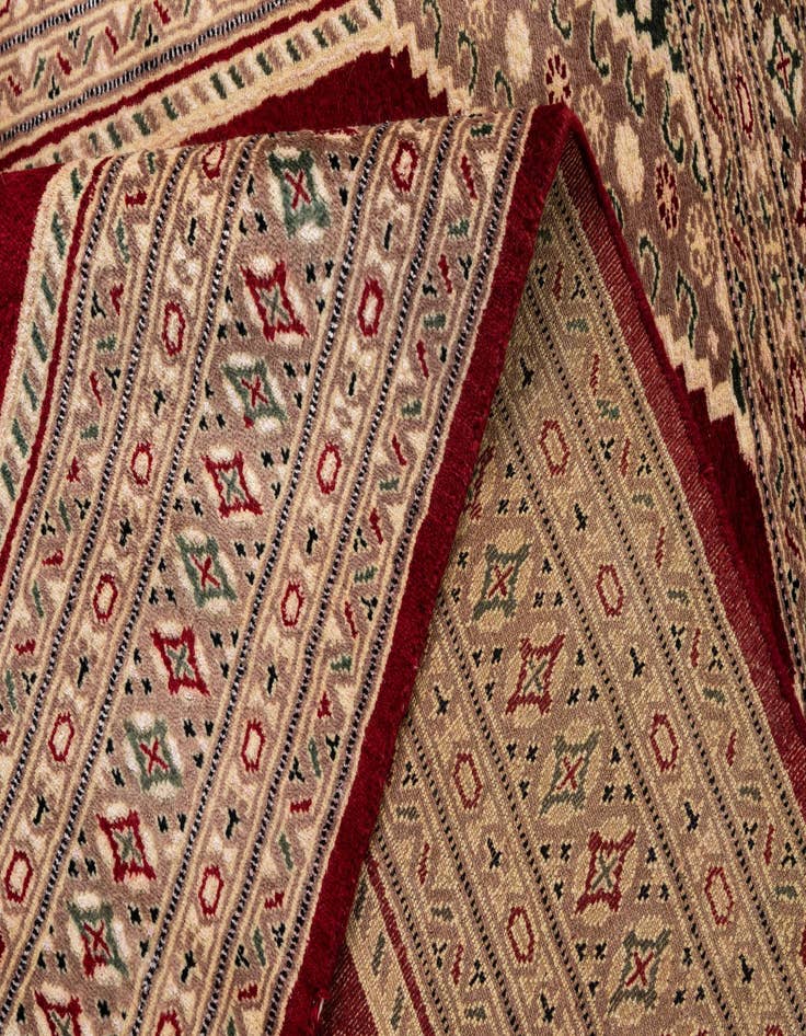 Detail image of 4' 2 x 6' 2  Hand Knotted Bokhara Oriental Rug