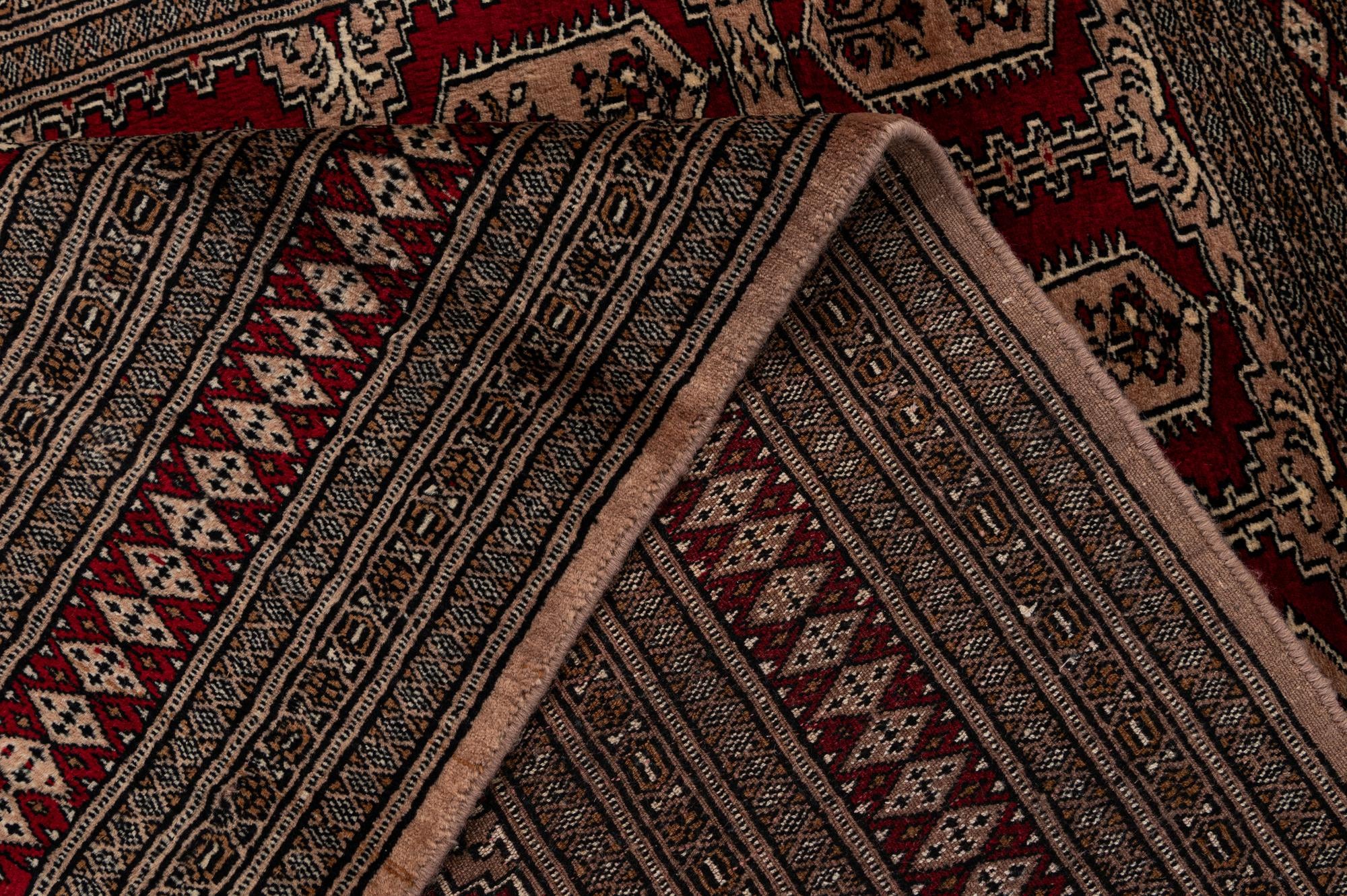 4' 2 x 5' 10 Hand Knotted Bokhara Wool Rug