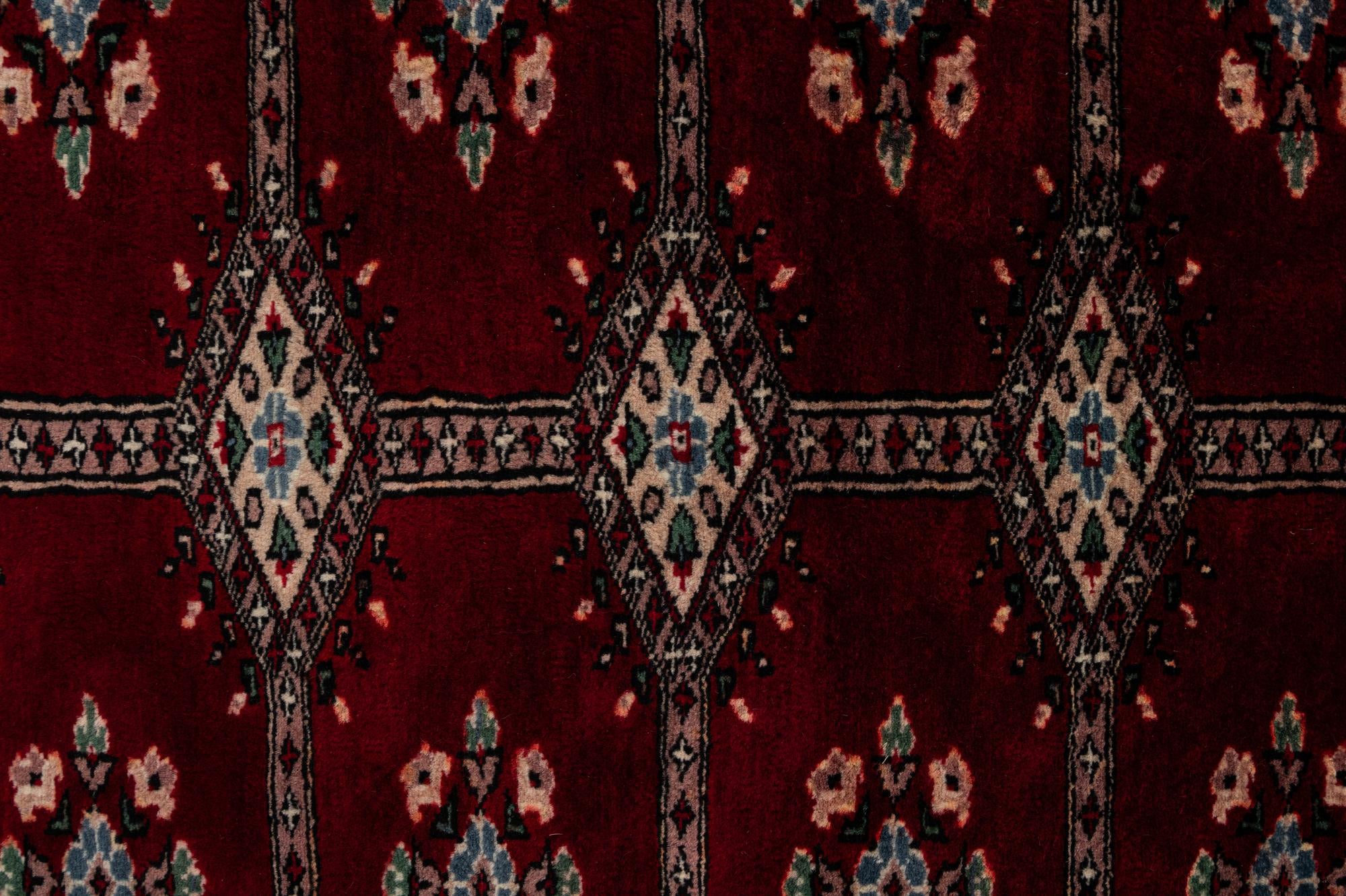 4' 2 x 5' 7 Hand Knotted Bokhara Oriental Wool Rug
