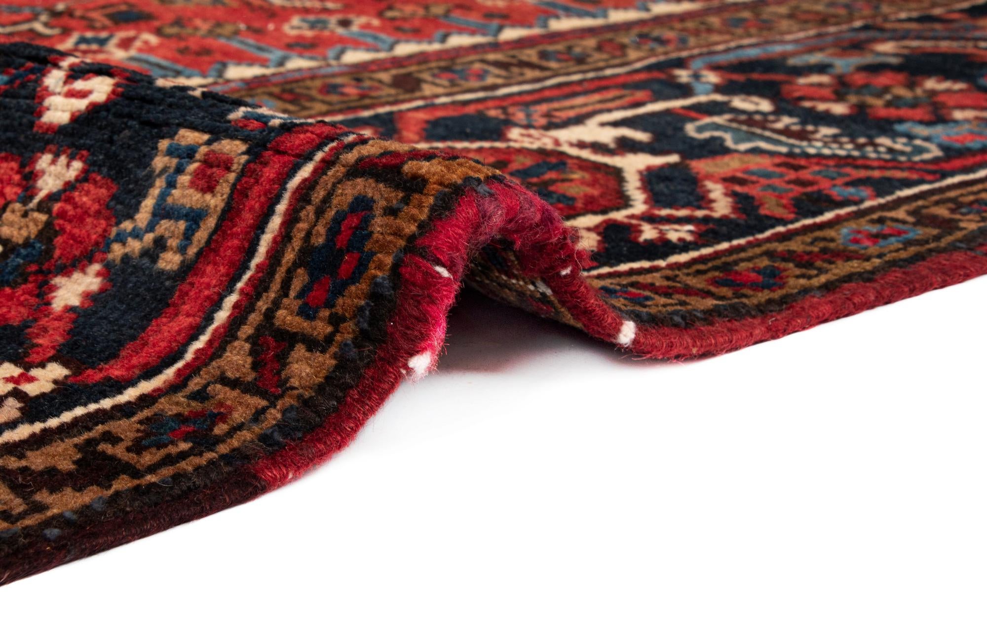 7' x 9' 8 Heriz Wool Rug