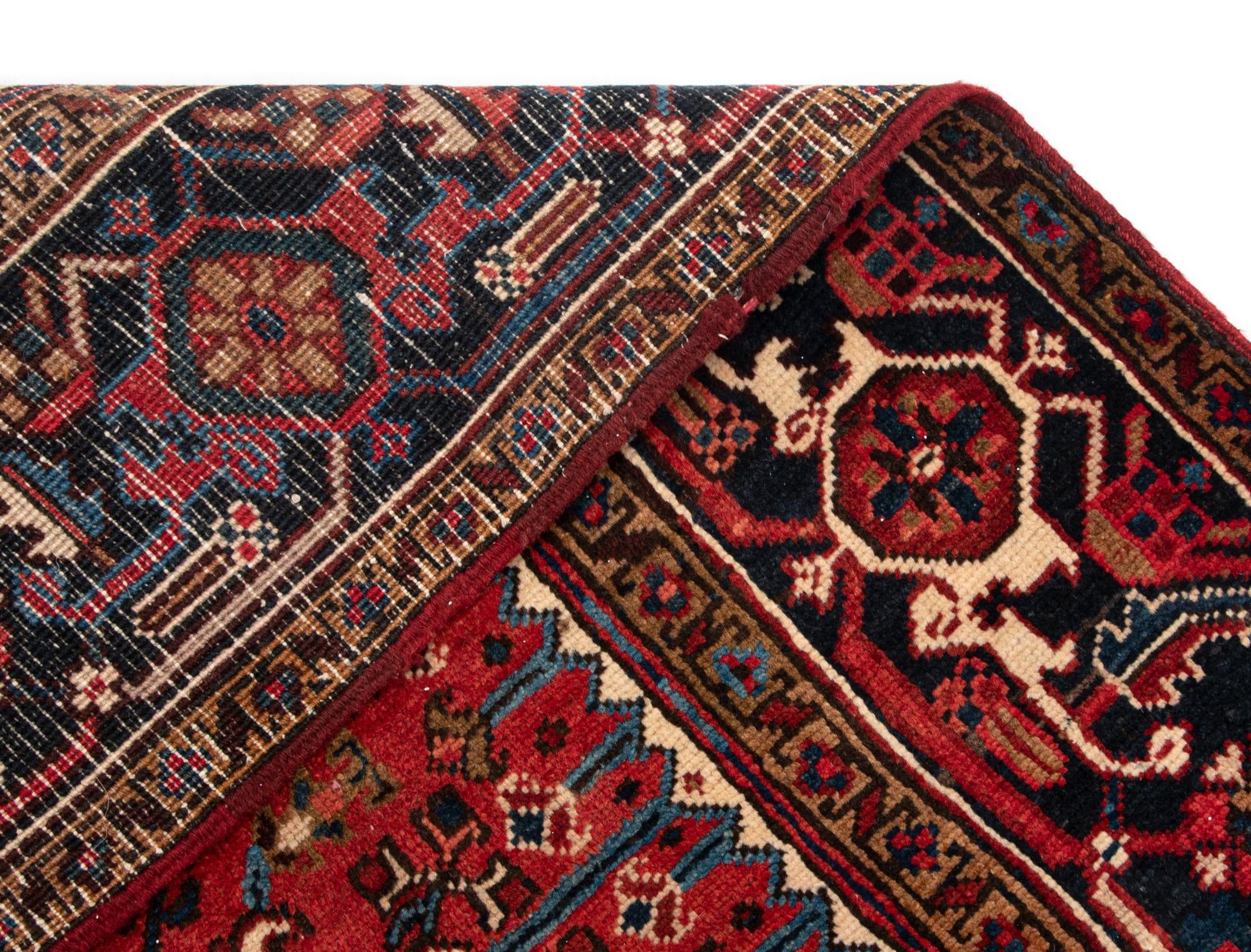7' x 9' 8 Heriz Wool Rug