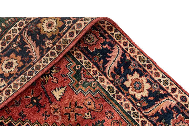 7' x 10' 7 Hand Knotted Heriz Wool Rug