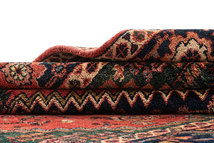 7' x 10' 7 Hand Knotted Heriz Wool Rug