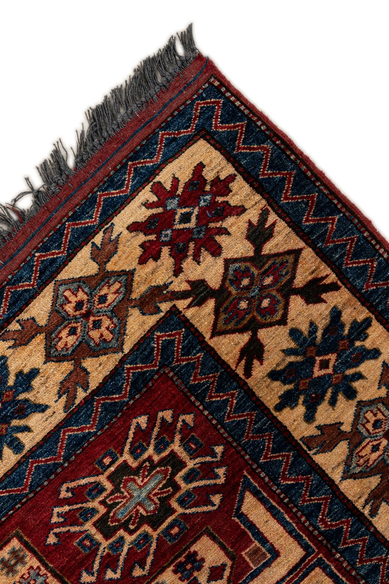 5' x 7' 2 Hand Knotted Kazak Wool Rug