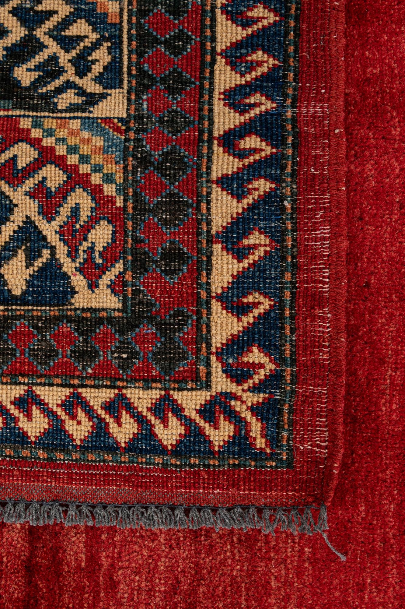 7' x 9' 10 Hand Knotted Kazak Wool Rug