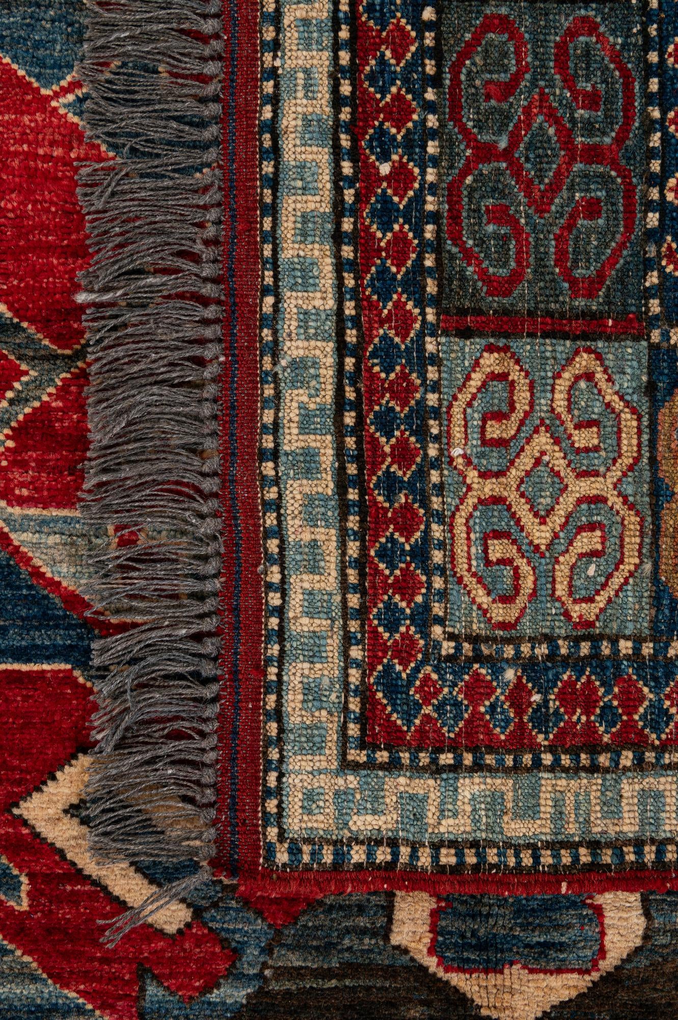 5' x 7' 9 Hand Knotted Kazak Wool Rug