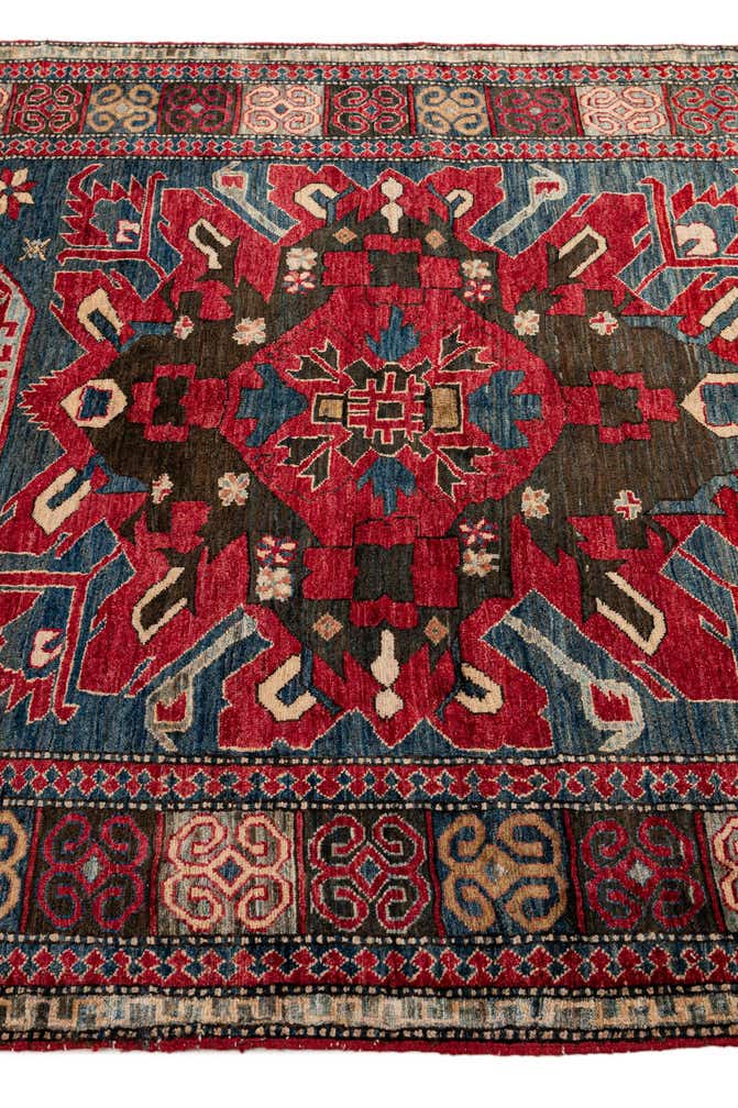 5' x 7' 9 Hand Knotted Kazak Wool Rug