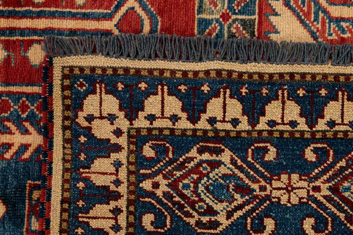 5' 2 x 6' 9 Hand Knotted Kazak Wool Rug