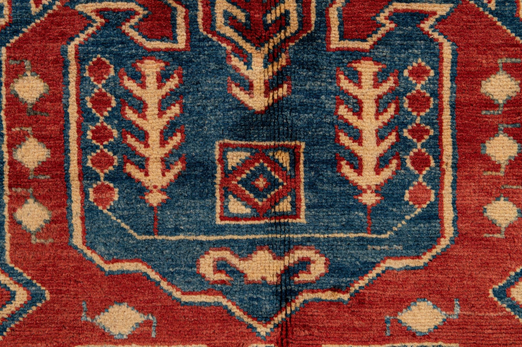 5' 2 x 6' 9 Hand Knotted Kazak Wool Rug