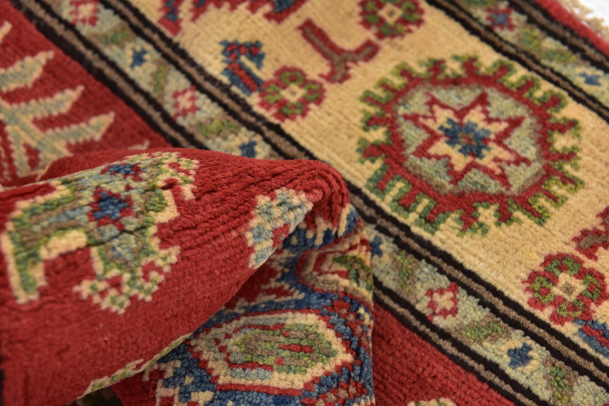 3' 3 x 5' 5 Hand Knotted Kazak Rug