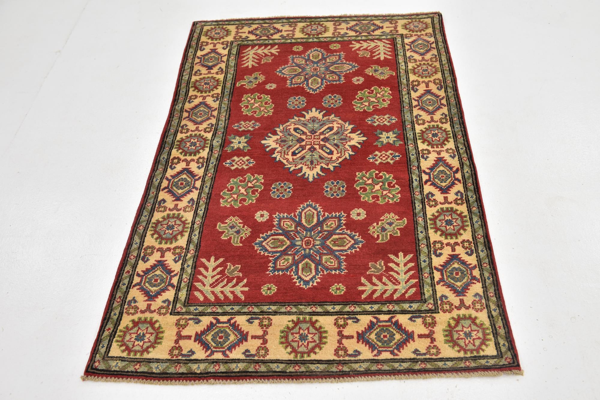 3' 3 x 5' 5 Hand Knotted Kazak Rug