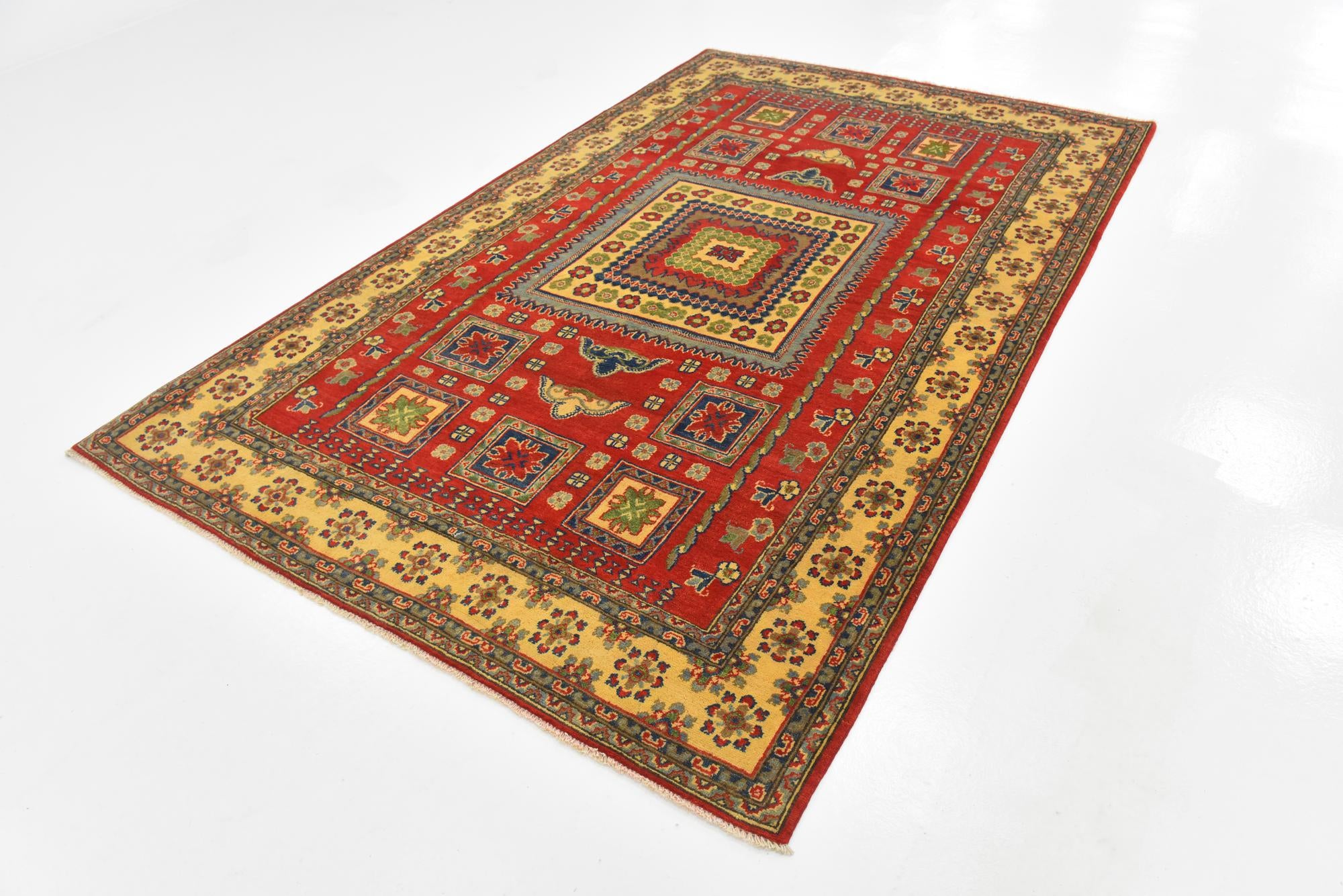 5' 8 x 9' 1 Hand Knotted Kazak Rug