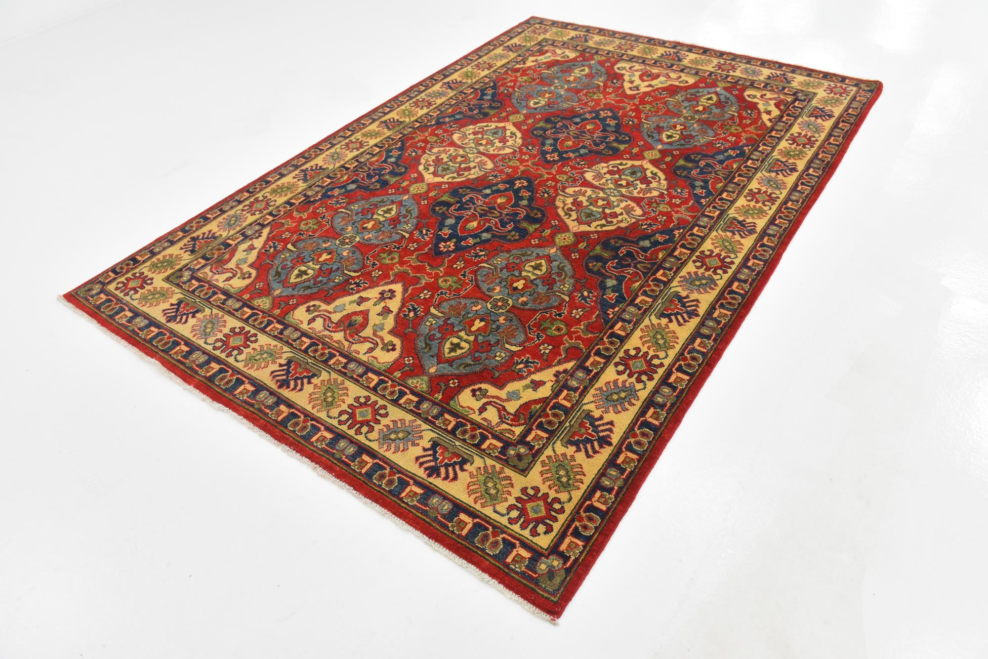 6' x 9' 1 Hand Knotted Kazak Rug